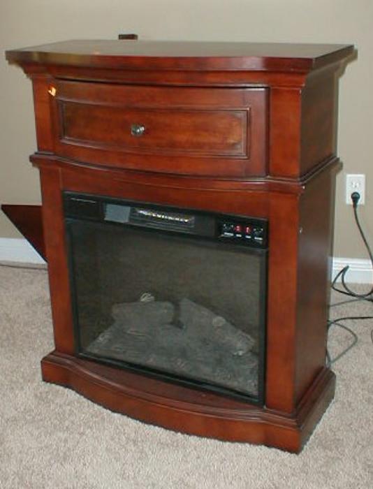 Faux fire
place/heater with
upper storage
drawer.
$197.50
