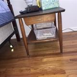 End Table. Wood below, upper formica.