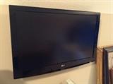 LG flat screen TV.  Wall mounted.