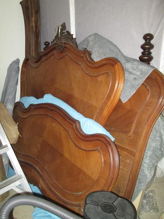 hard to see from this photo- please forgive.  We have two antique French head and foot boards- Queen size