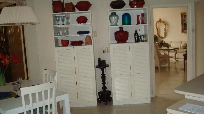 smart storage ideas: storage cabinets; pottery and artifacts also for sale