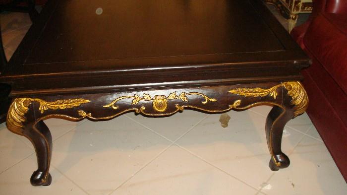 cocktail table dark wood with gilded legs