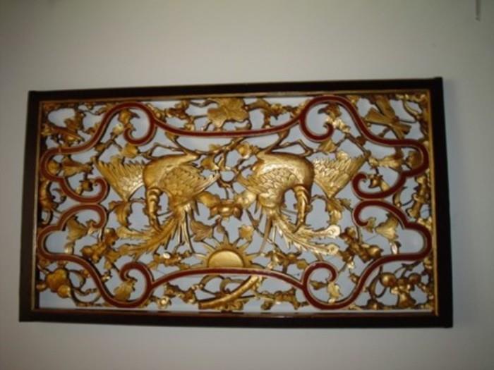 Asian carvings and wall hangings