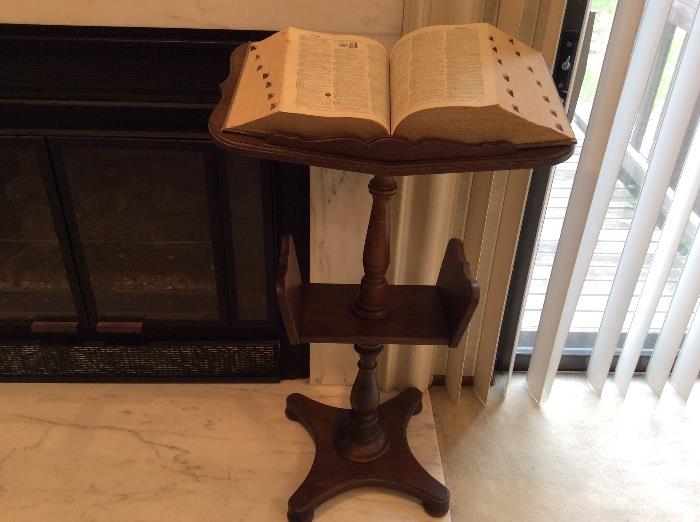 Antique book stand and vintage dictionary
