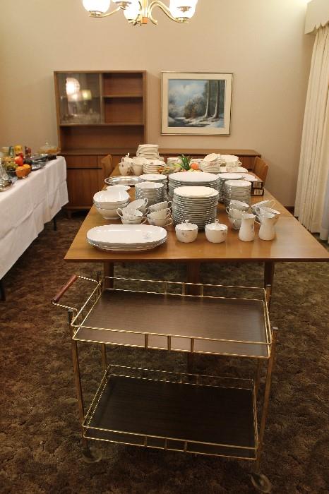 Vintage tea cart, gate leg dining table with leaves, mid-century modern china cabinet with buffet.
