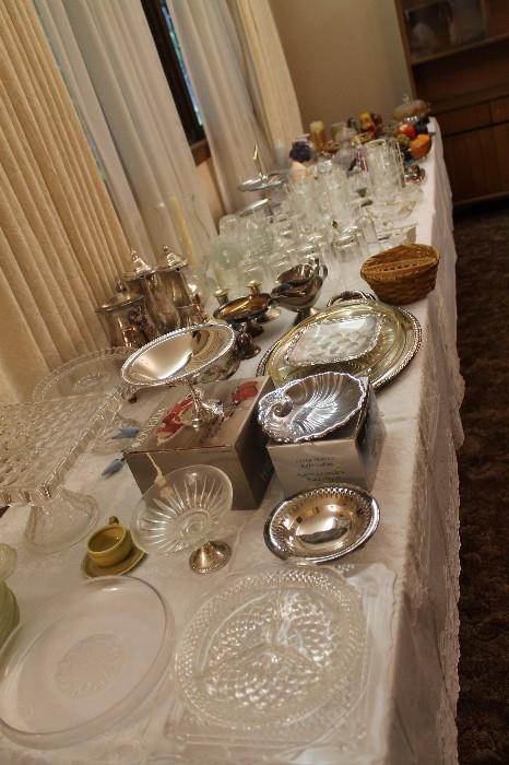 Lots and lots of serve ware in glass, crystal and silver plate. 