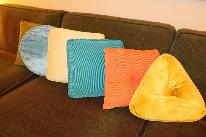 Geometric and round mid century modern pillows. Some are made of corduroy!!! Super cool! 