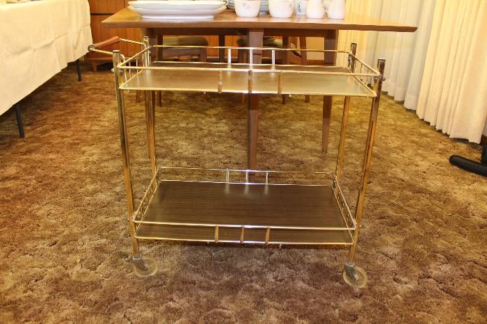 Metal tea cart in excellent condition. The wheels work perfectly.
