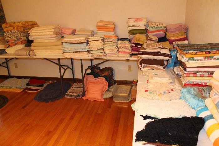 Lots and lots of sheet sets, pillow cases, table cloths, quilts, cotton and wool blankets in pristine condition.