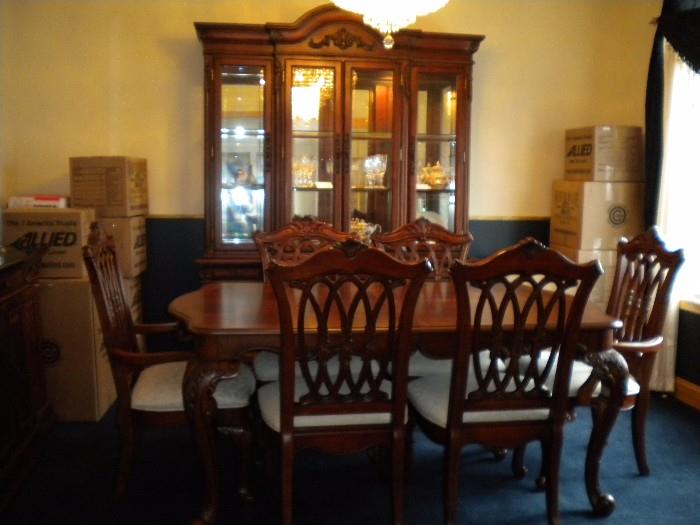 Universal Furniture Dinning room, table six chairs China cabinet and buffet.    
