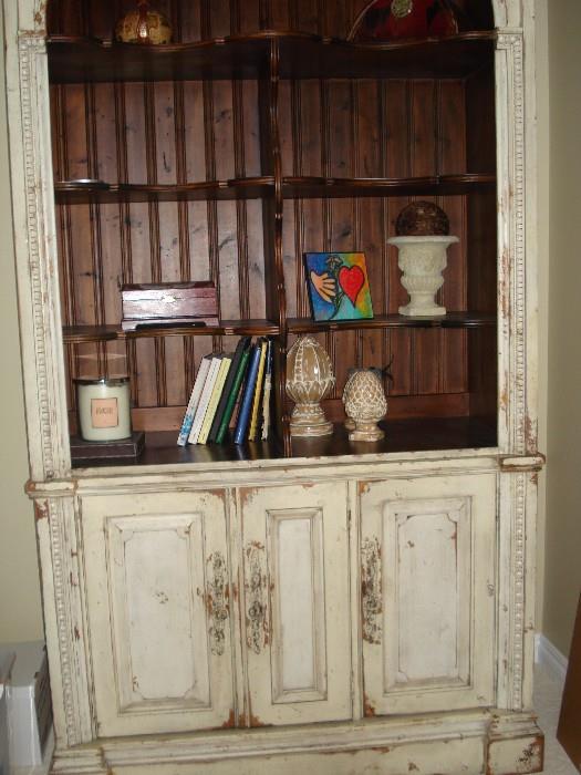 Wooden bookcase with enclosed cabinets on the base.  This item is oversized to fit in a 2 story great room or other room with extended ceiling height.  Item is not onsite due to large size. 