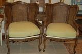 Double cane and mahogany Louis style chairs. Linen cushions.