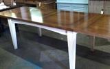 Extension Dining Table. Cream base, light wood top.