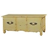 Mustard colored mahogany French Country chest.