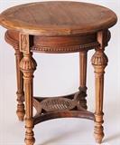 Louis style side table with cane and carving.