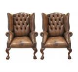 Ralph Lauren vintage distressed leather wing back chairs.