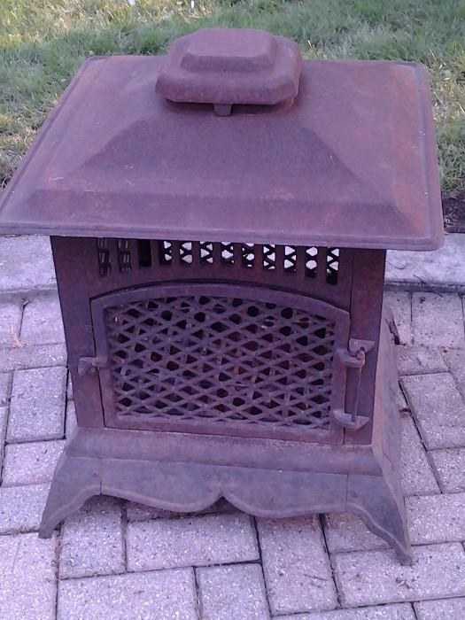 VERY COOL & UNIQUE....SOLID CAST IRON FIRE PIT!!!
