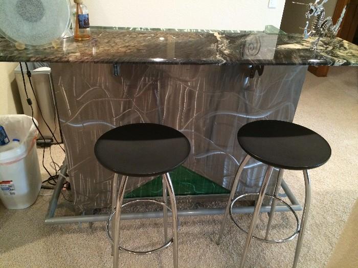 Custom metal bar with marble top and mini-fridge (from Gregory's Contemporary Furniture)