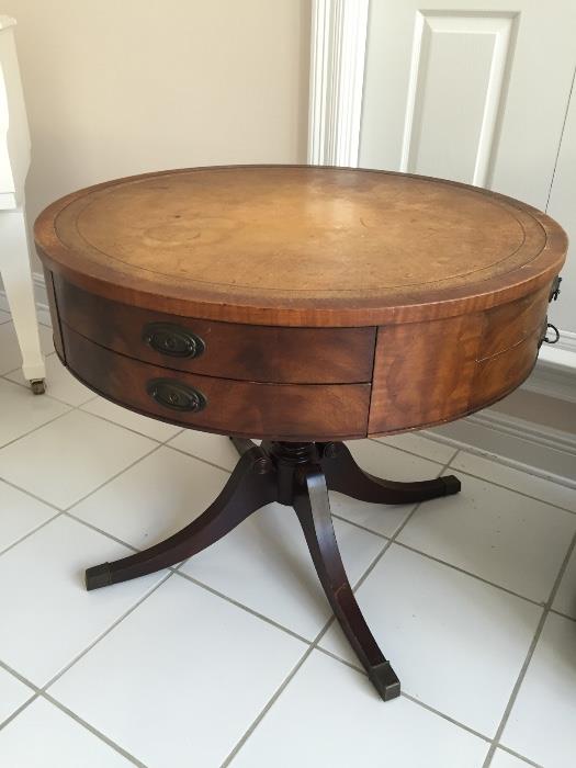 This one is super nice - vintage Duncan Phyfe style leather top drum table in excellent condition!  