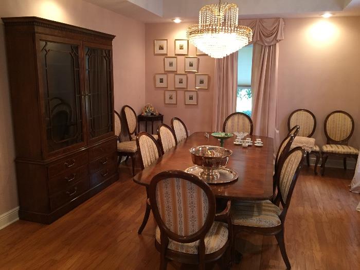 Very fine dining room suite. The table includes leaves and pads, and seats 12. 
