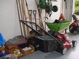 Newer lawnmower, wheel barrow