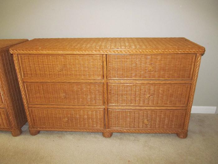 One of two matching six drawer wicker dressers.  