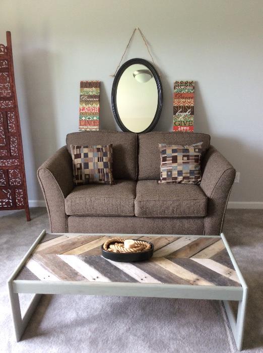 Tweed chocolate brown Loveseat. How great is that chevron patterned coffee table?