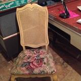 2 french provincial chairs with rattan back and floral seat ready for a shabby redo