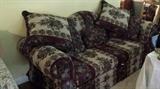 Small well made floral sofa