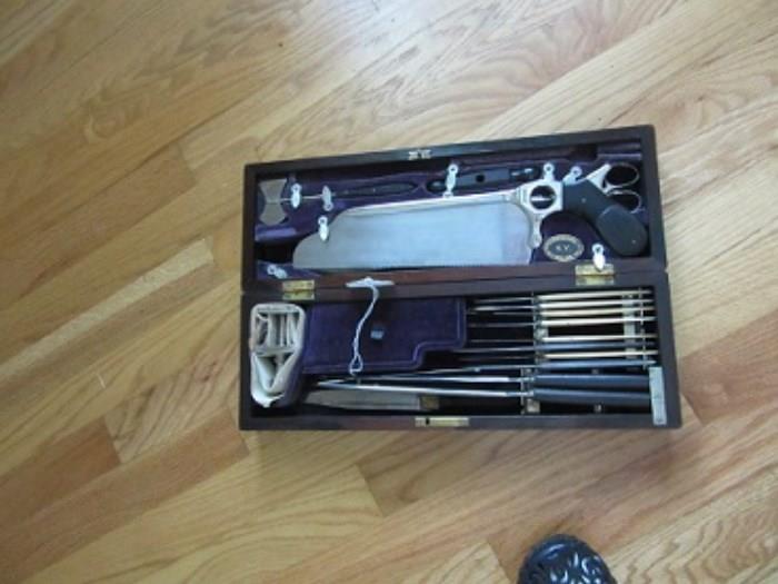 Surgical kit made by Shepard & Dudley  150 William Street, NY  The case is Rosewood.  Checking online I found that this is the most complete of any other Rosewood surgical sets I have seen.