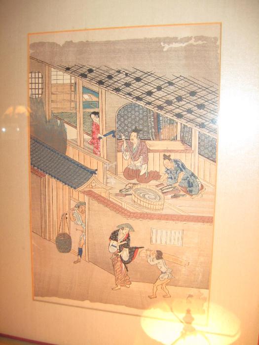 One of a pair of framed oriental art