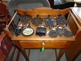 cast iron trivets and matchbox holders