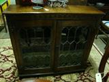 Oak leaded glass bookcase
