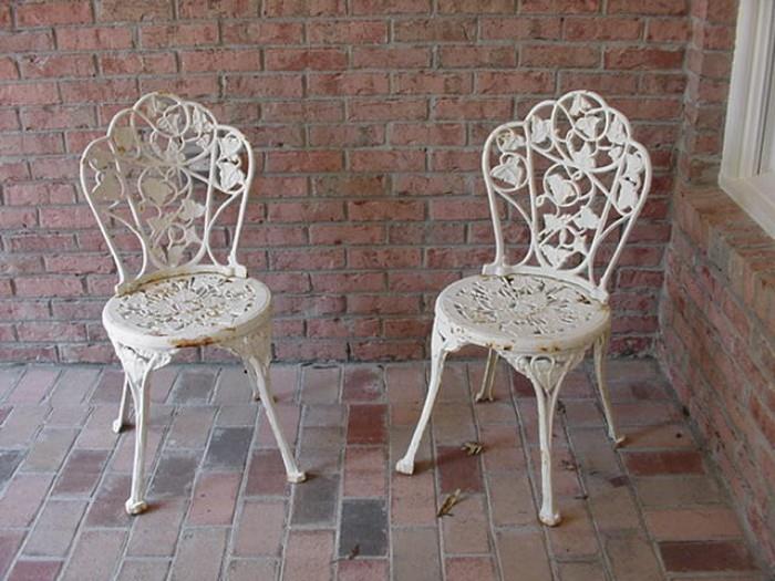 Pair of cast iron chairs
