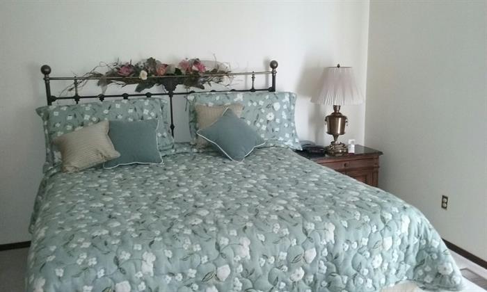 king size mattress, boxspring, headboard plus expensive coverlet and accessories.