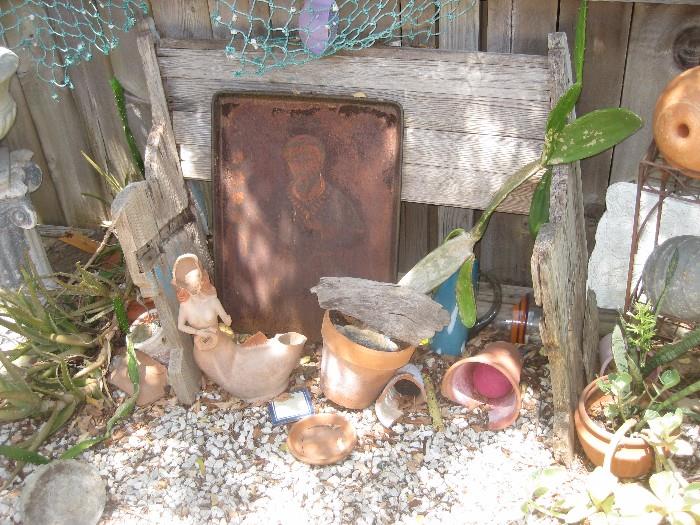 The backyard is chock full of bits and pieces collected over the years. Bring a bin or a wheelbarrow and pile it up!