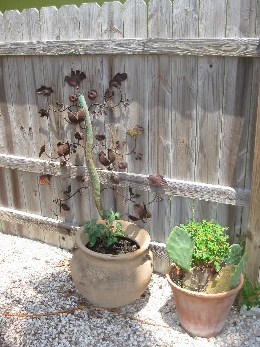 Potted plant and yard art