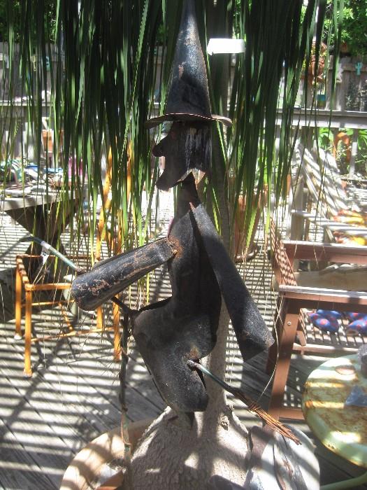 metal witch sculpture