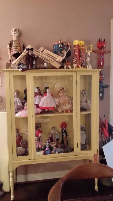 Vintage doll and folk art collection