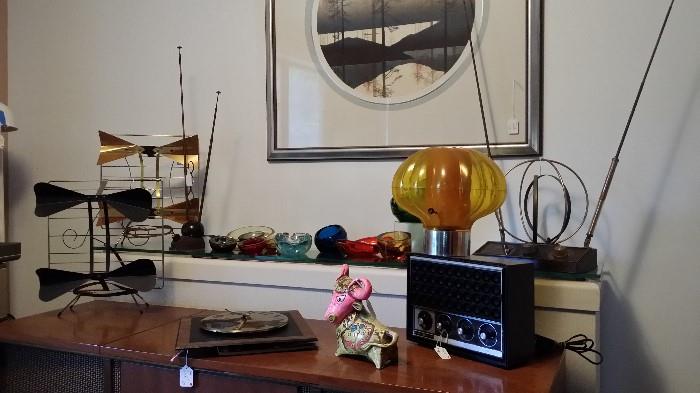 Vintage television antennae, art glass ashtrays, clocks, vintage radio, vintage table lamp