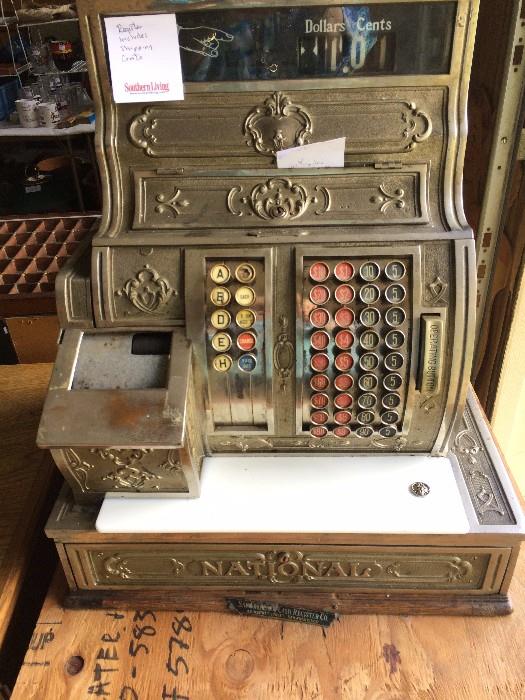 Antique National brass cash register with marble plate