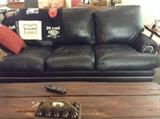 Standard sized HARLEY black leather sofa. 