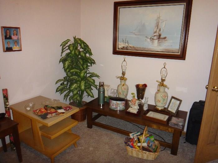 Assorted items in "Christmas Room".   Lamps, coffee table, oil painting, faux plant. 