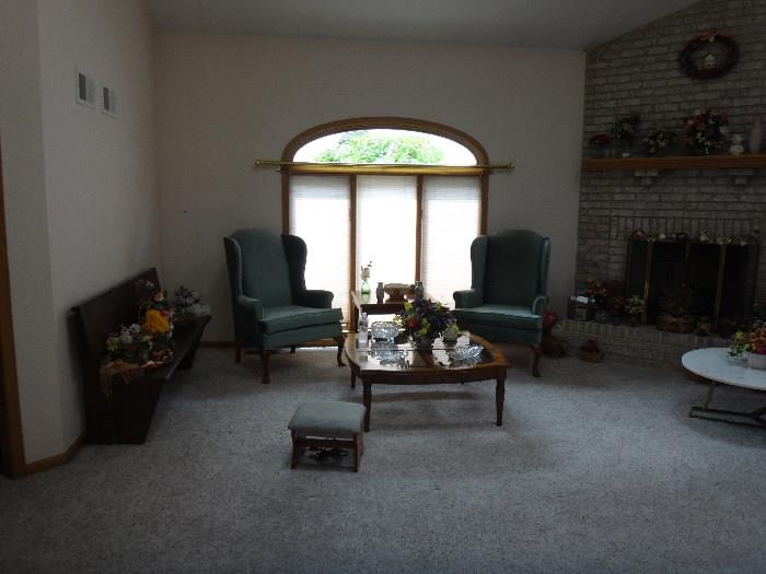 Living Room Wing Chairs, Bench, Coffee Tables.  Wood & glass coffee tables and marble top coffee table.   