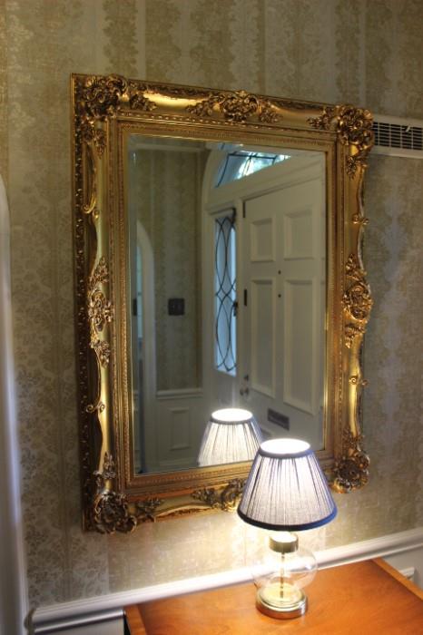 Ornate gold mirror.