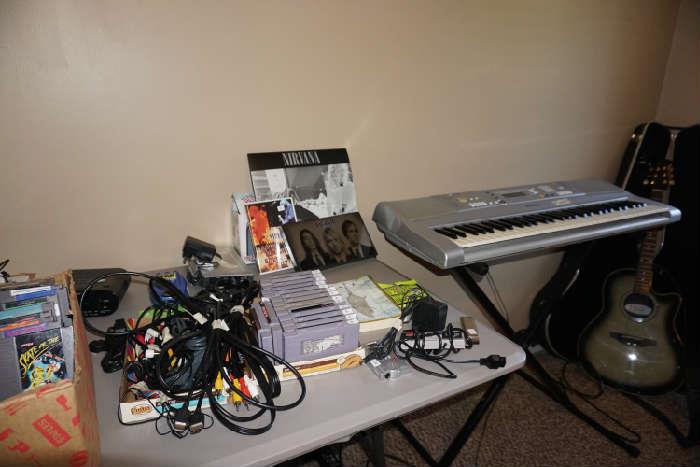 Misc connecting wires, Nintendo games, key board, electric guitar and case