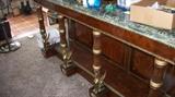marble top buffet with griffins