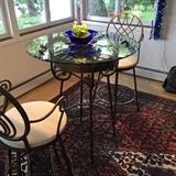 glass top table and chairs