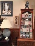 two-piece oak display cabinet, Precious Moments collectors editions, lamp