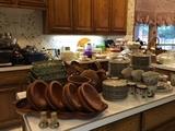 wood bowls, pottery, lots of kitchen gadgets, Pyrex, cookware